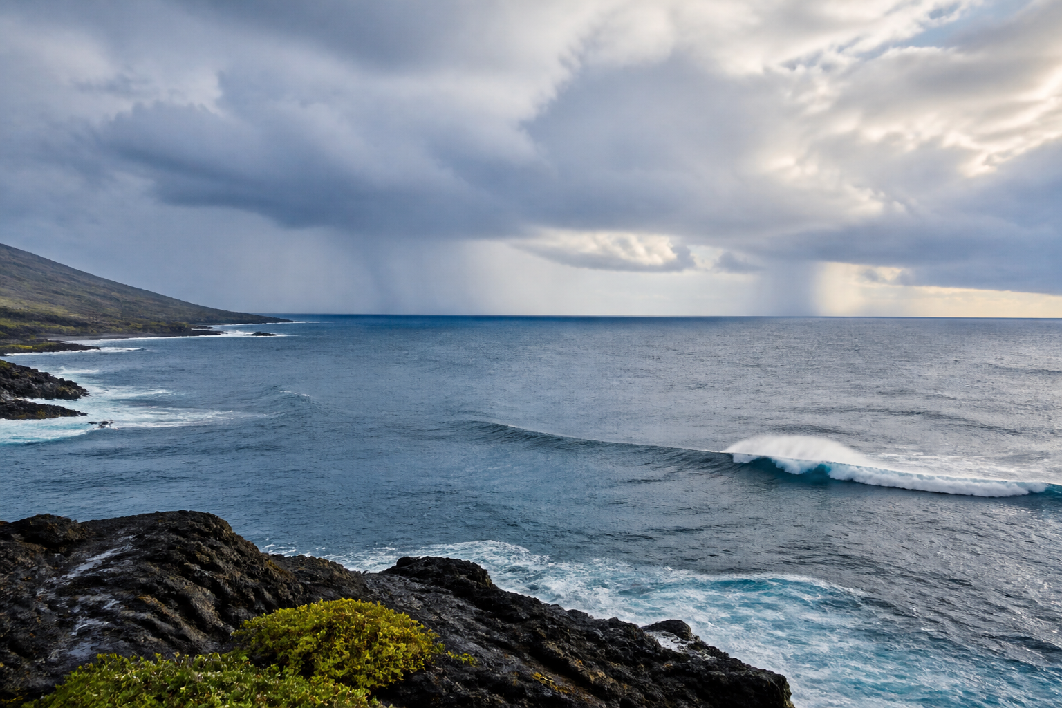 Rain bands and ocean swells along a Pacific coastline